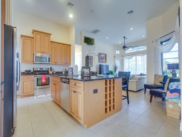 Marco Island 6 Bedroom Canal Front Home with Caged Pool