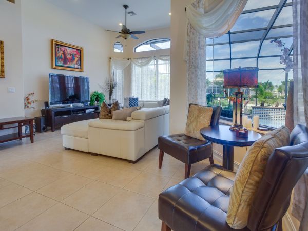 Marco Island 6 Bedroom Canal Front Home with Caged Pool