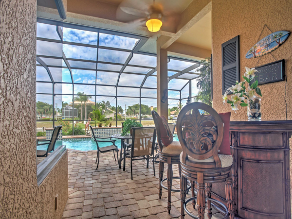 Marco Island 6 Bedroom Canal Front Home with Caged Pool