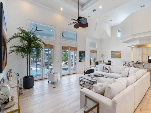 Impeccable Naples Waterfront Home with Caged Pool & Spa