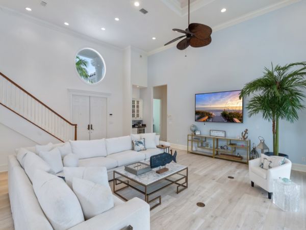 Impeccable Naples Waterfront Home with Caged Pool & Spa