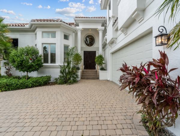 Impeccable Naples Waterfront Home with Caged Pool & Spa