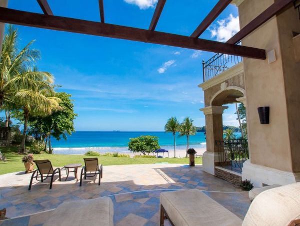 Luxury Six Bedroom Flamingo Villa Steps from Beach