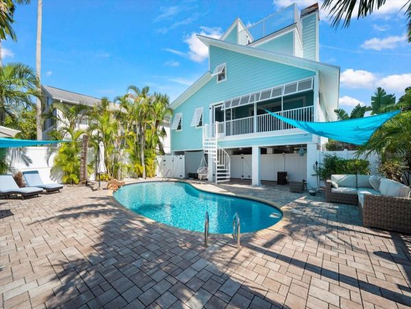 Luxury Island Retreat Awaits in this Siesta Key Pool Home