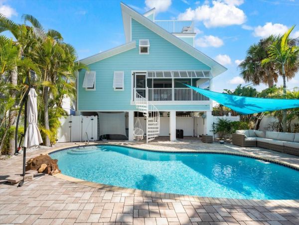 Luxury Island Retreat Awaits in this Siesta Key Pool Home