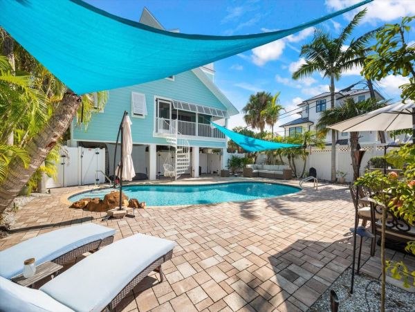 Luxury Island Retreat Awaits in this Siesta Key Pool Home