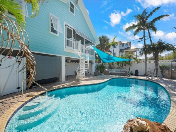 Luxury Island Retreat Awaits in this Siesta Key Pool Home