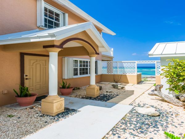 Cayman Islands Seaside Serenity: Your Private Oceanfront Oasis