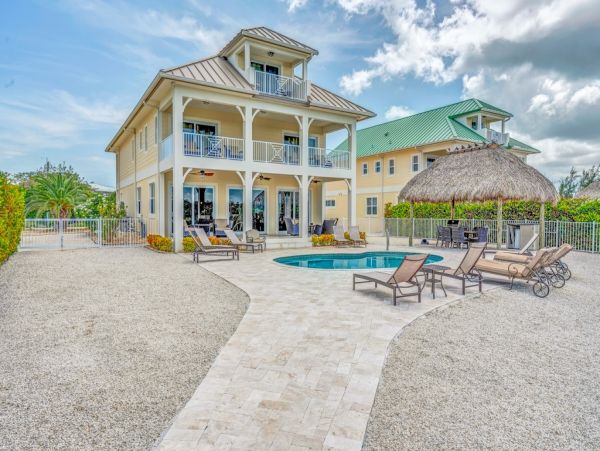 Luxury Waterfront Vacation Home with Pool Sleeps 14 Guests