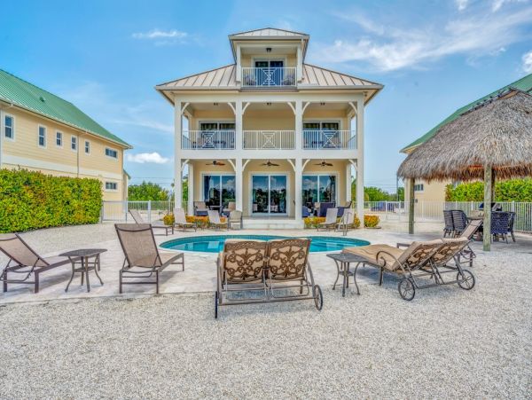 Luxury Waterfront Vacation Home with Pool Sleeps 14 Guests
