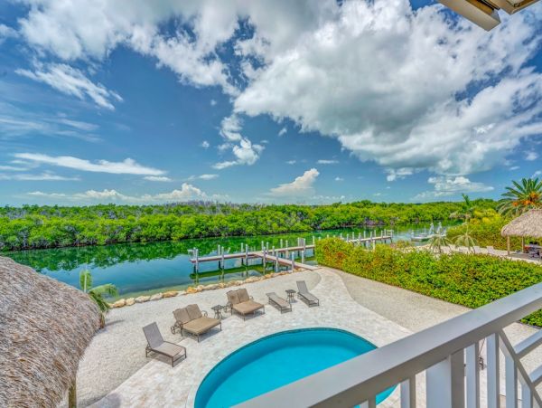 Luxury Waterfront Vacation Home with Pool Sleeps 14 Guests