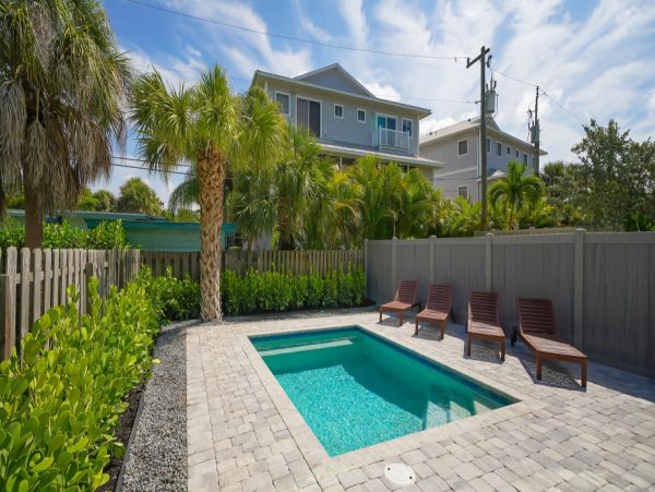 Three Bedroom New Condo Right Across From Beach