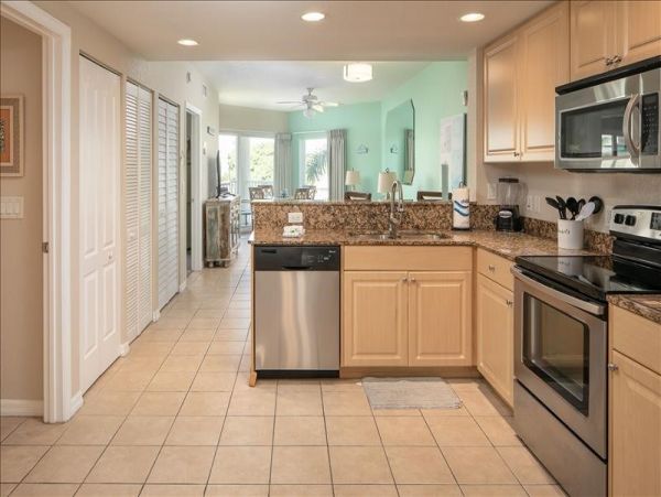 Treasure Island Beachfront Condo Florida Gulf Coast Vacation Rental with Pool & Hot Tubs