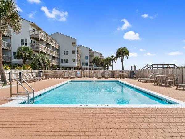 Gulf-Front Panama City Condo with Pool & Daily Attraction Perks