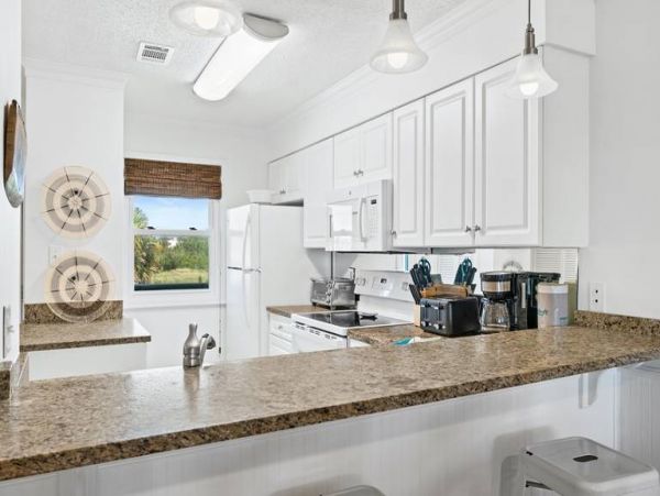 Gulf-Front Panama City Condo with Pool & Daily Attraction Perks