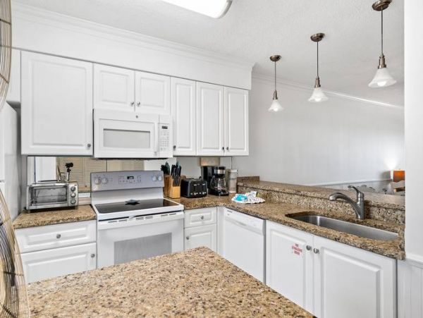 Gulf-Front Panama City Condo with Pool & Daily Attraction Perks
