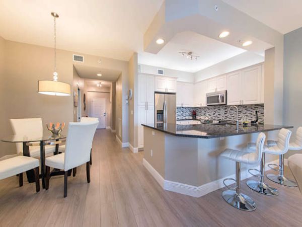 Three Bedroom Modern Condo Steps from the Beach and Restaurants
