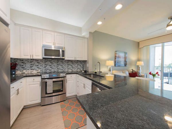 Three Bedroom Modern Condo Steps from the Beach and Restaurants