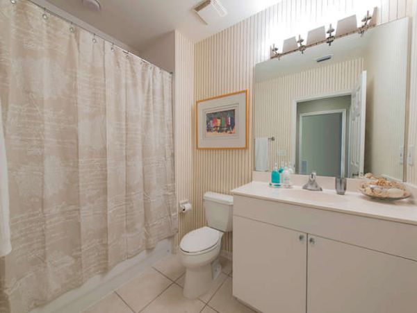 Three Bedroom Modern Condo Steps from the Beach and Restaurants