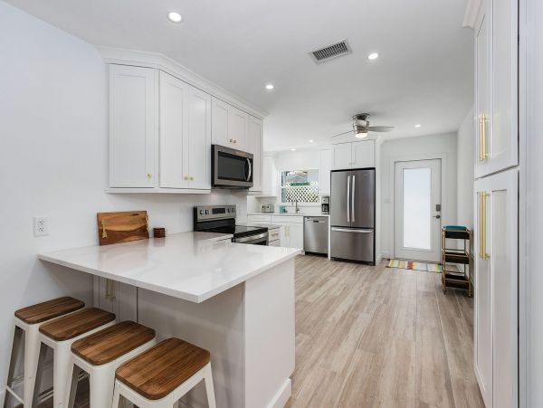 Four Bedroom Family Home with Caged Pool in Fort Myers Beach