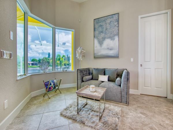 Great Canalfront Home on Cape Coral with Caged Pool & Dock