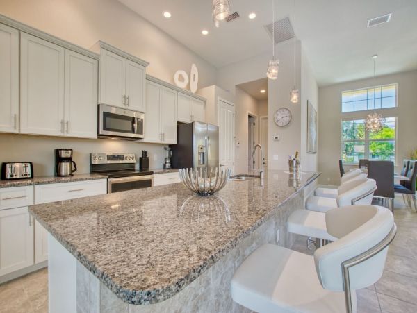 Great Canalfront Home on Cape Coral with Caged Pool & Dock