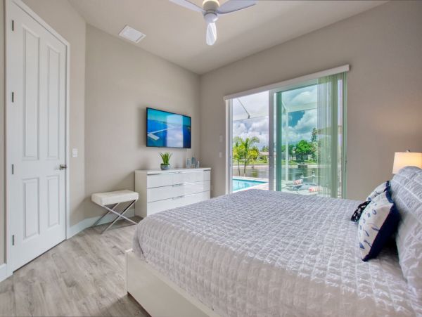 Great Canalfront Home on Cape Coral with Caged Pool & Dock