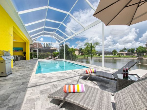 Great Canalfront Home on Cape Coral with Caged Pool & Dock