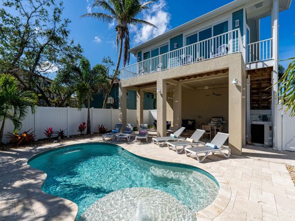 Fort Myers Beach Vacation Rental - 4-Bedroom Pool Home with Balconies