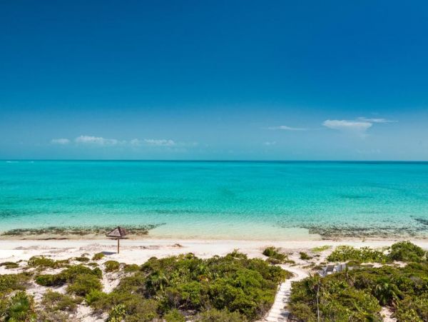 On Beach Turks and Caicos Vacation Home + Guests House Sleeps 16