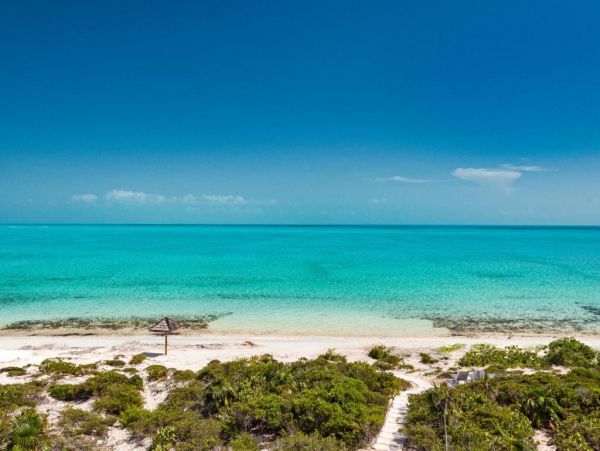 On Beach Turks and Caicos Vacation Home + Guests House Sleeps 16