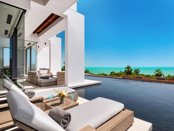 On Beach Turks and Caicos Vacation Home + Guests House Sleeps 16