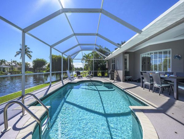 Beautiful Waterfront Home with Caged Pool in Cape Coral