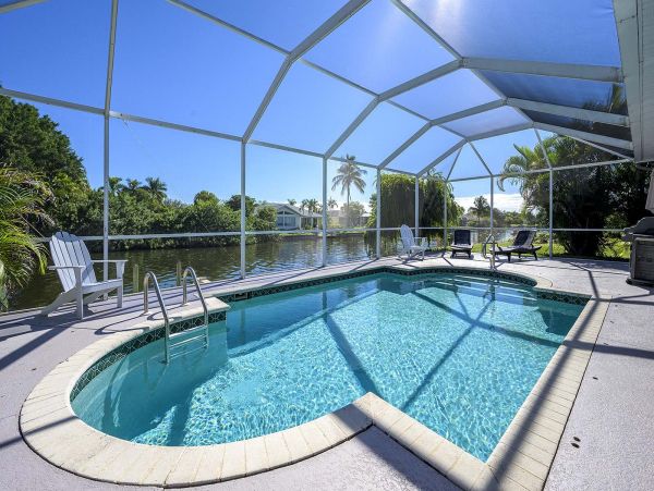 Beautiful Waterfront Home with Caged Pool in Cape Coral