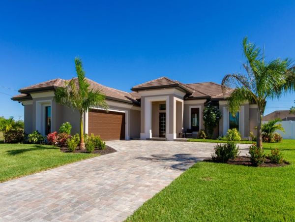 3 Bedroom Canal Front Home in Cape Coral with Caged Pool