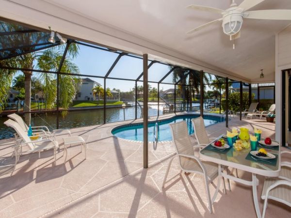 Beautiful Canal-front Vacation Home in Cape Coral with Caged Pool