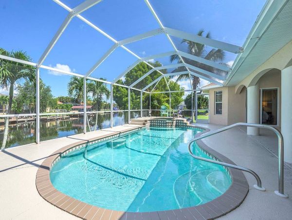 Cape Coral Vacation Rental Villa - Florida Gulf Coast Waterfront Home with Pool & Spa