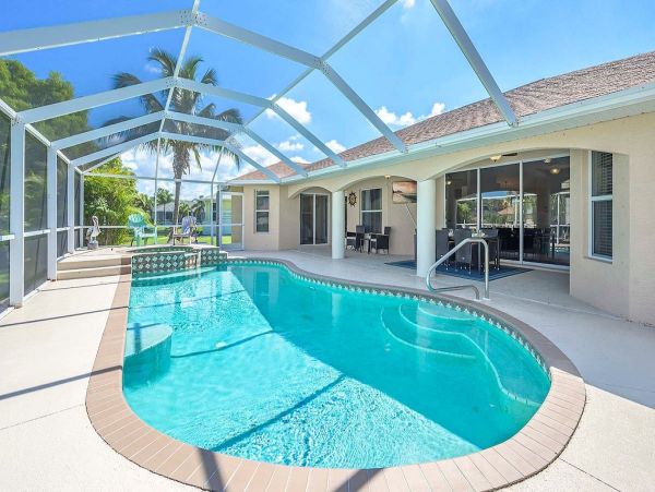 Cape Coral Vacation Rental Villa - Florida Gulf Coast Waterfront Home with Pool & Spa