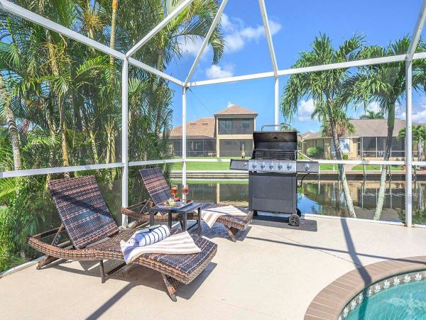 Cape Coral Vacation Rental Villa - Florida Gulf Coast Waterfront Home with Pool & Spa
