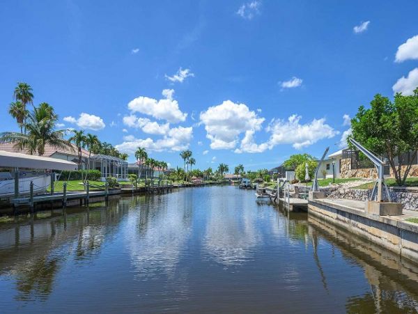 Cape Coral Vacation Home Canal Views & Private Caged Pool