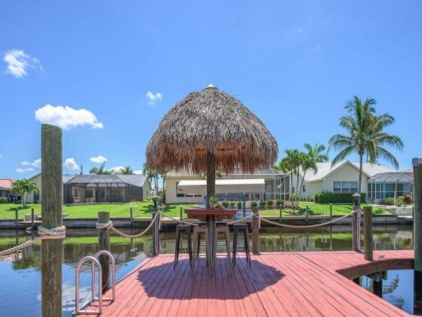 Cape Coral Vacation Home Canal Views & Private Caged Pool