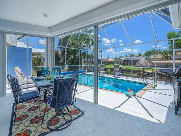 Cape Coral Vacation Home Canal Views & Private Caged Pool