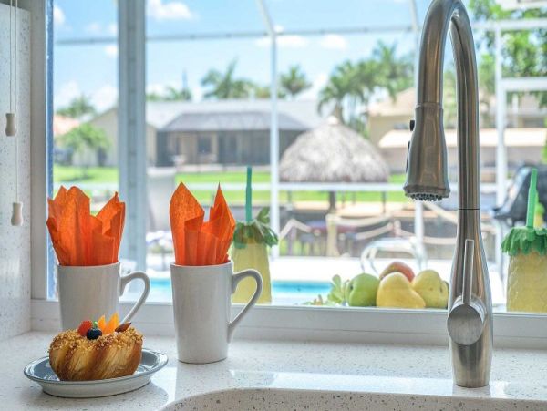Cape Coral Vacation Home Canal Views & Private Caged Pool
