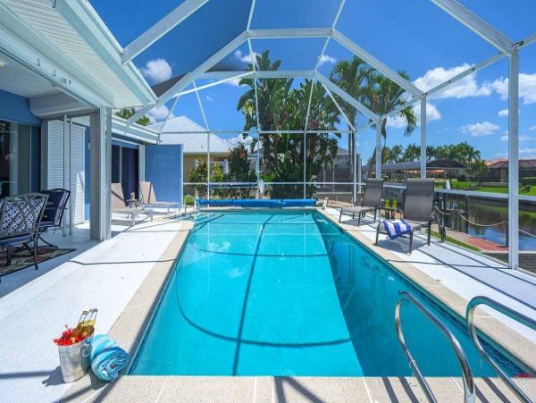 Cape Coral Vacation Home Canal Views & Private Caged Pool