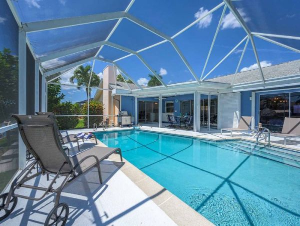 Cape Coral Vacation Home Canal Views & Private Caged Pool