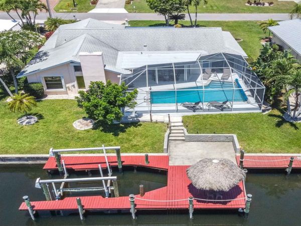 Cape Coral Vacation Home Canal Views & Private Caged Pool