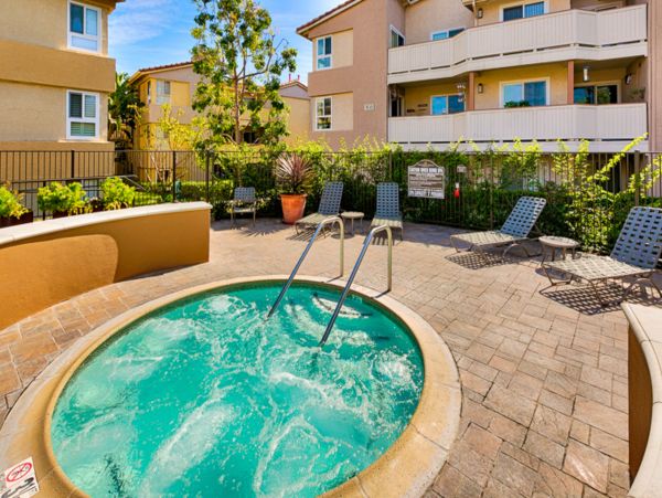 Ground floor beach home with pool, hot tub, patio space and great location