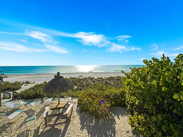 Ocean views Holmes Beach Condo with Community Pool
