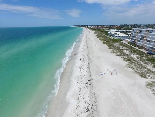 Luxury Holmes Beach Vacation Rental - Anna Maria Island Townhome with Pool & Golf Cart