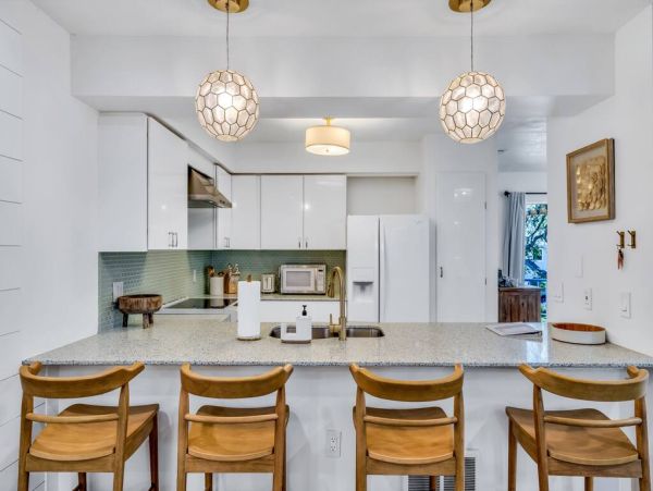 Luxury Holmes Beach Vacation Rental - Anna Maria Island Townhome with Pool & Golf Cart